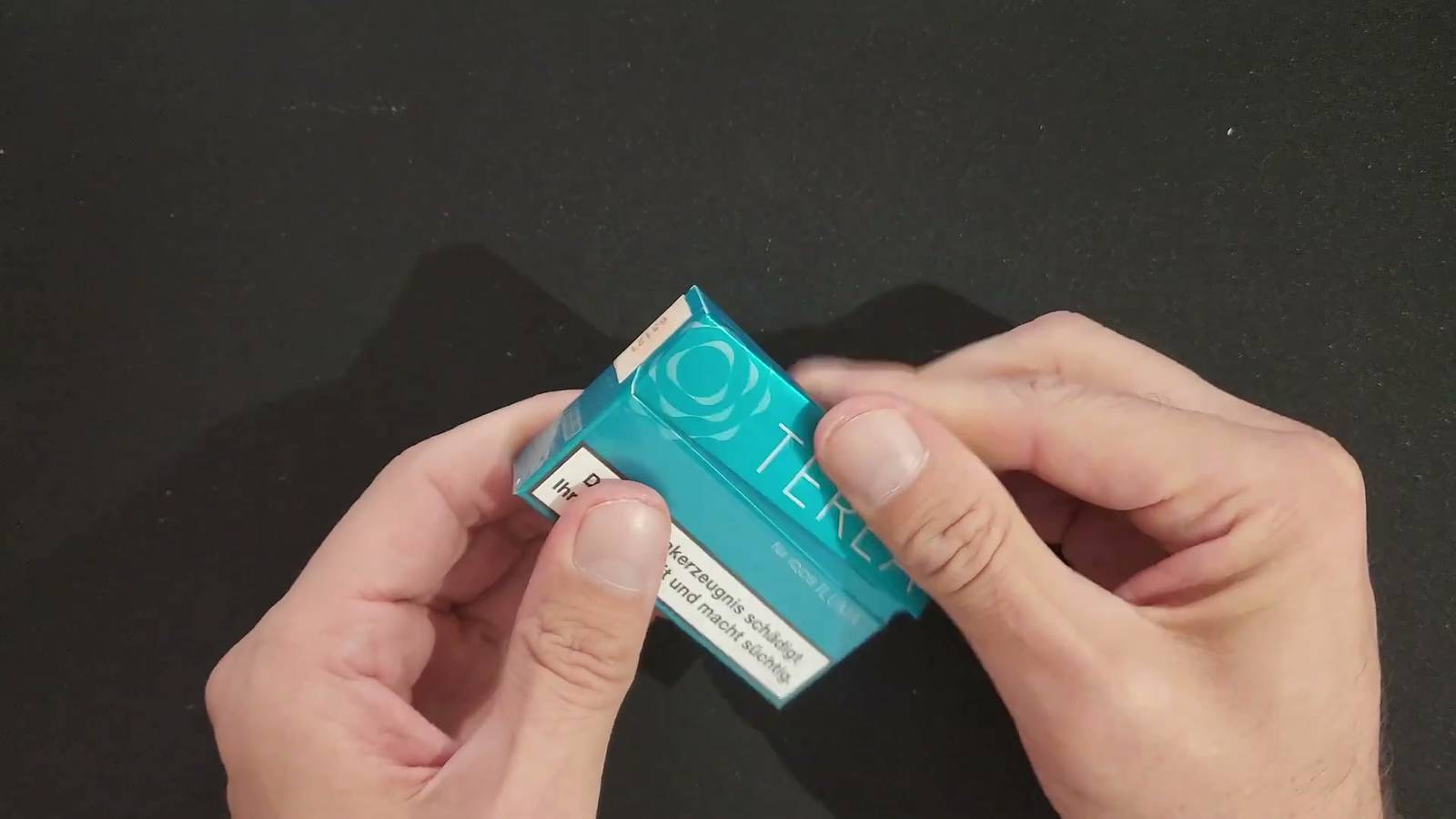 The IQOS Iluma Holder discussed in the video